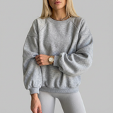 Sweter damski oversize z okrągłym dekoltem i balonowymi rękawami